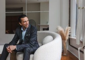Entrepreneur during branding photoshoot in Vancouver office space, captured by personal brand photographer